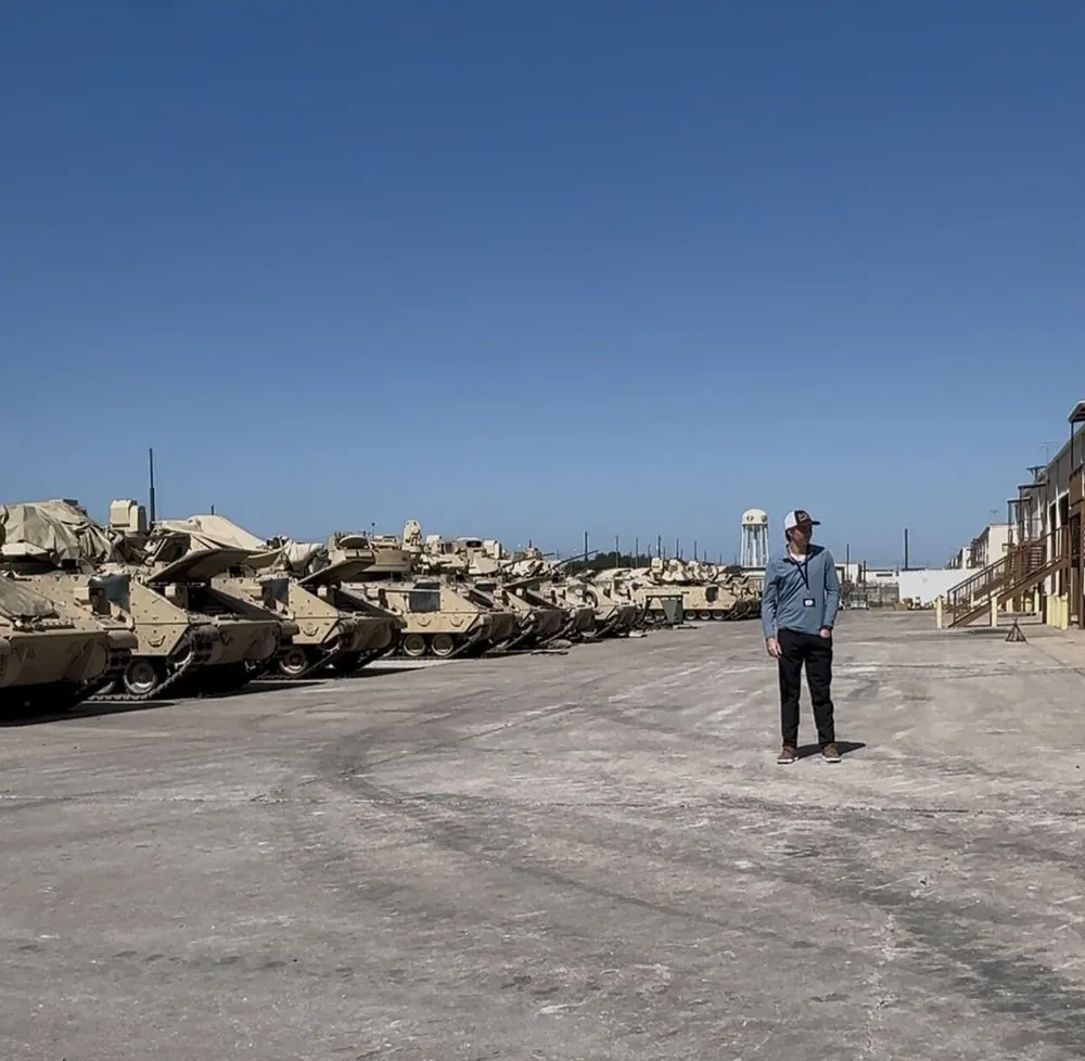 BreachON field test at Fort Hood, row of Army vehicles staged in a motor pool